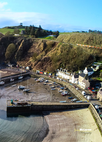 Stonehaven harbour with war memorial in back ground
